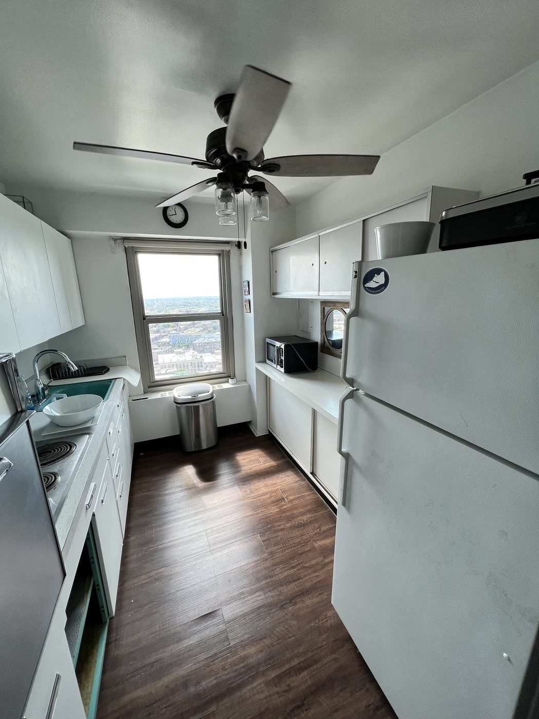 Lakeview high-rise, galley to peninsula, before