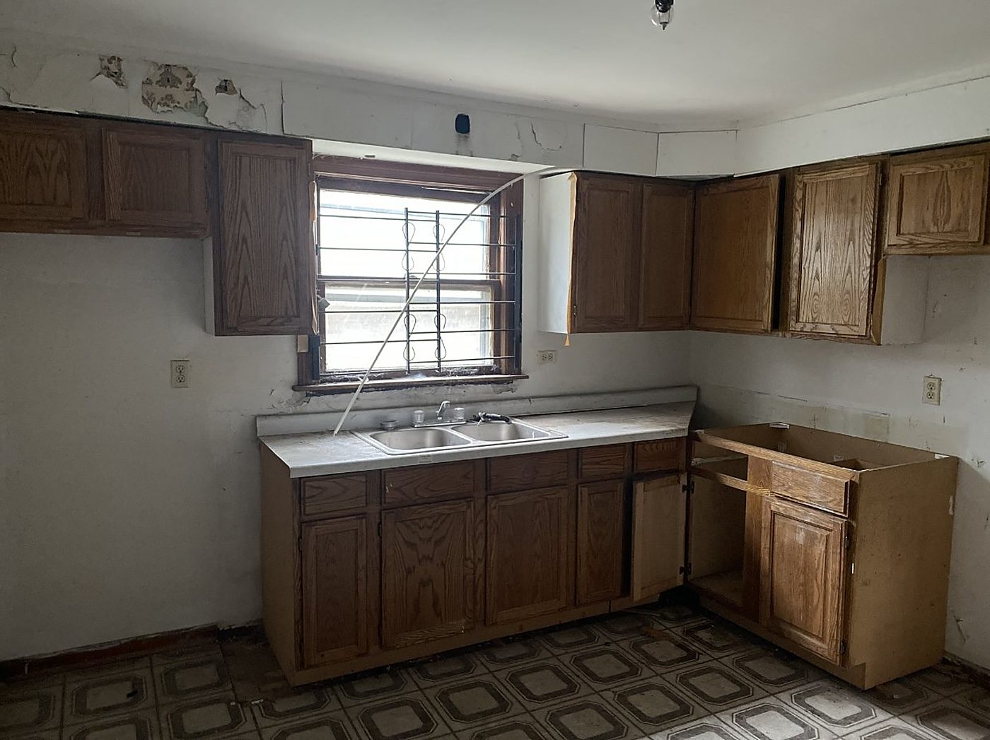 West side frame house, before